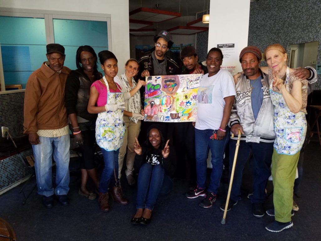 Neighbors Together members paint mural