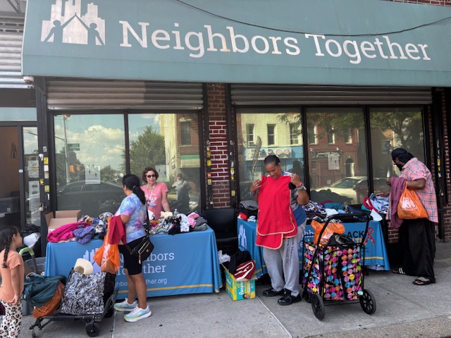 Neighbors Together volunteers outside the Community Café